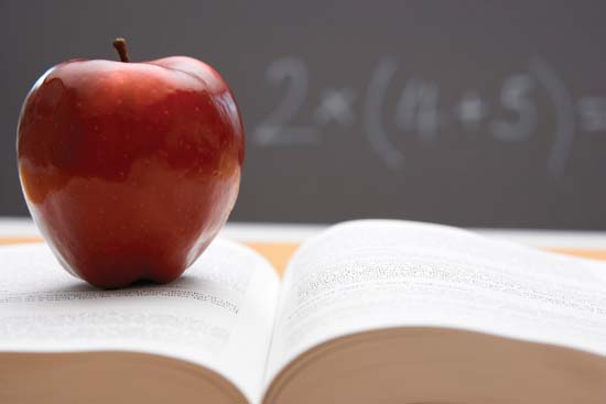 Curriculum Image of apple on textbook