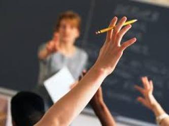 Picture of a student raising his hand